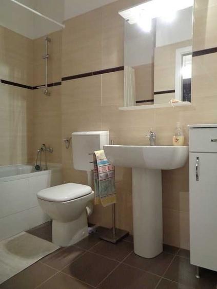 Apartament cu 2 camere semidecomandat în Răcădău