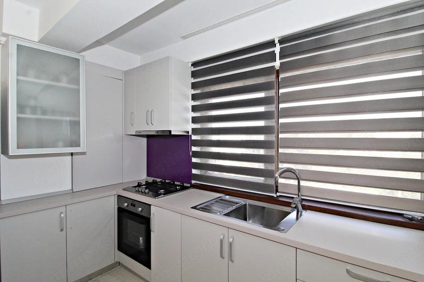 Apartament cu 3 camere semidecomandat în Km 4
