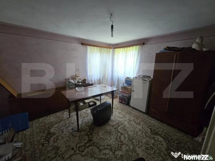 Casă cu 3 camere cu Teren 1500 Mp în Central