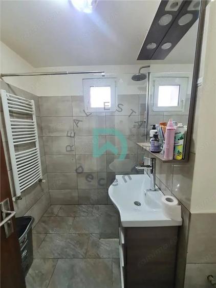 Apartament cu 3 camere decomandat în Craiter