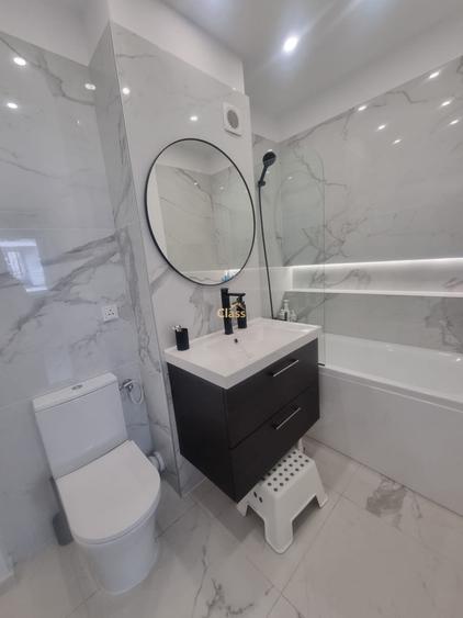 Apartament cu 2 camere semidecomandat, mobilat în Baciu
