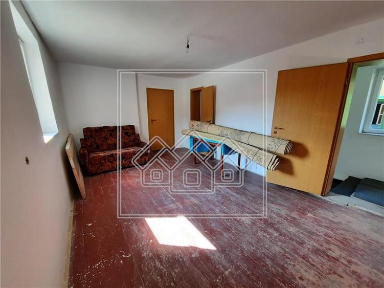 Casă individuală cu 4 camere cu Teren 1177 Mp în Cisnădioara