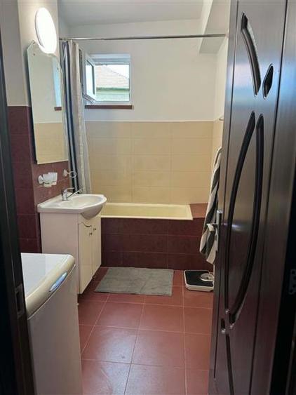 Apartament cu 2 camere semidecomandat, mobilat în Central