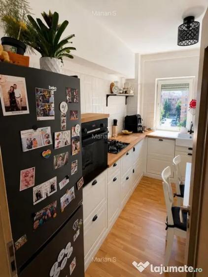 Apartament cu 4 camere semidecomandat în Tractorul