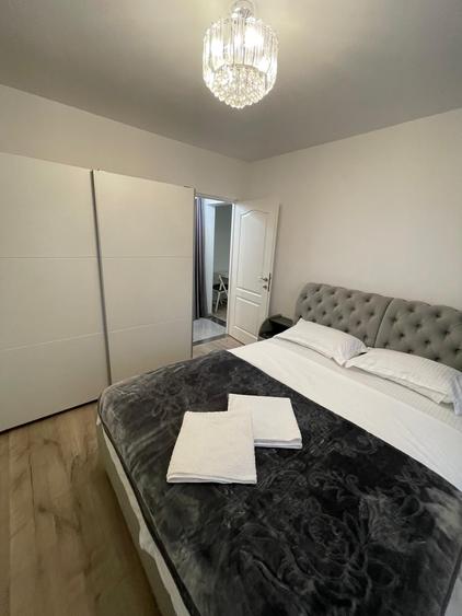 Apartament cu 2 camere semidecomandat, mobilat în P-ța Victoriei