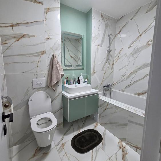 Apartament cu 3 camere semidecomandat, mobilat în Baciu
