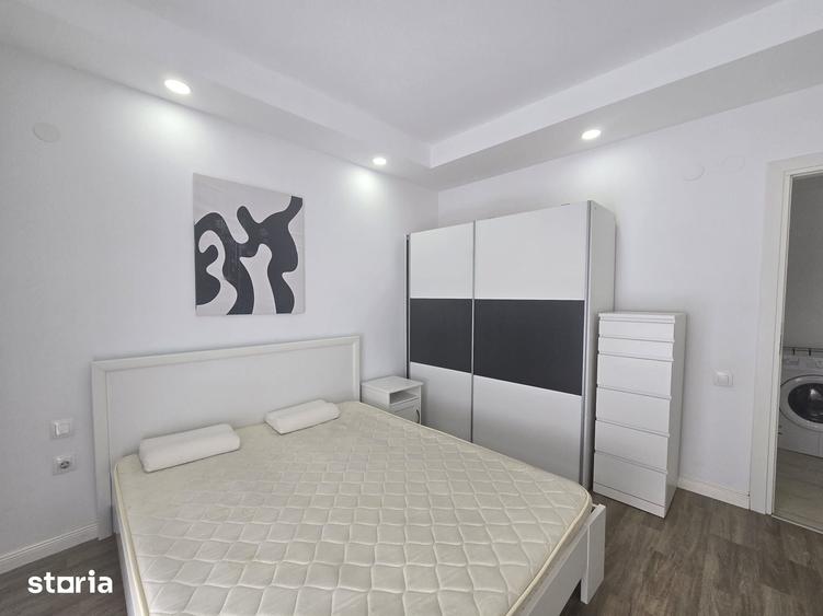 COSMOPOLIS - Apartament cu 2 camere si gradina, mobilat si utilat. - 9
