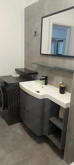 Apartament cu 2 camere semidecomandat, mobilat în Central