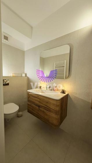 Apartament cu 2 camere semidecomandat, mobilat în Central