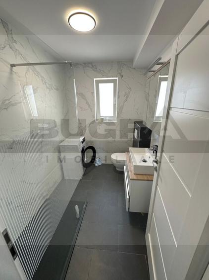 Apartament cu 3 camere semidecomandat, mobilat în Borhanci