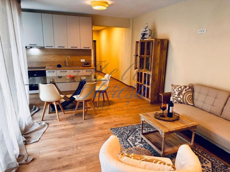 Apartament cu 3 camere semidecomandat, mobilat în Borhanci