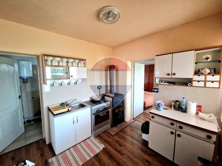 Casă individuală cu 2 camere cu Teren 1002 Mp în Augustin