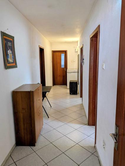 Casă cu 4 camere cu Teren 100 Mp în Central
