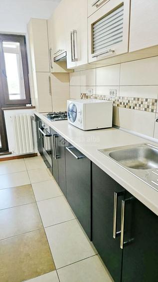 Apartament cu 2 camere semidecomandat, mobilat în Central