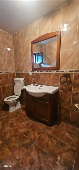 Casă cu 4 camere cu Teren 1000 Mp în Central
