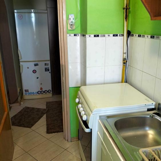 Apartament cu 2 camere semidecomandat în Podu Roș