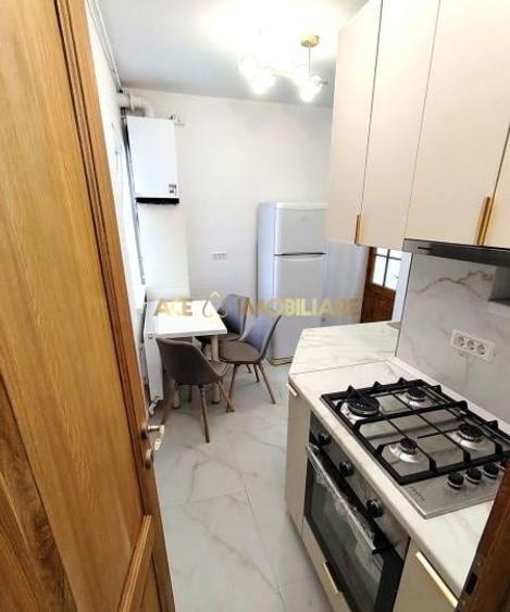 Apartament cu 3 camere semidecomandat, mobilat în 1 Mai