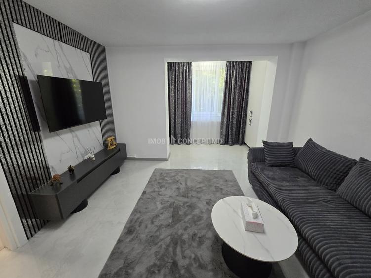 Apartament cu 3 camere semidecomandat, mobilat în Cina