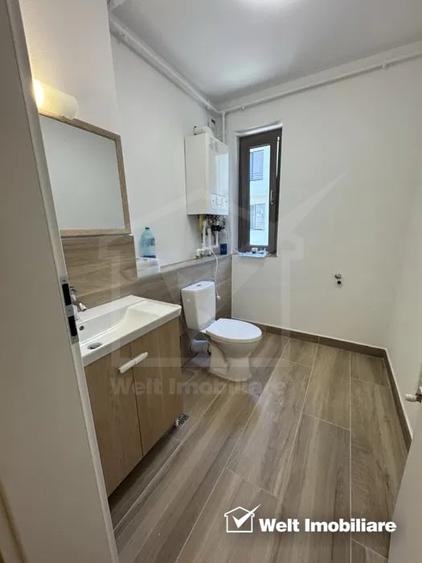 Apartament cu 3 camere semidecomandat, mobilat în Borhanci