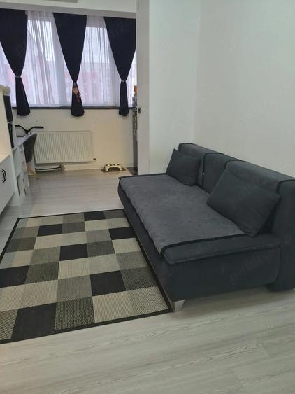 Apartament cu 2 camere semidecomandat, mobilat în UTA