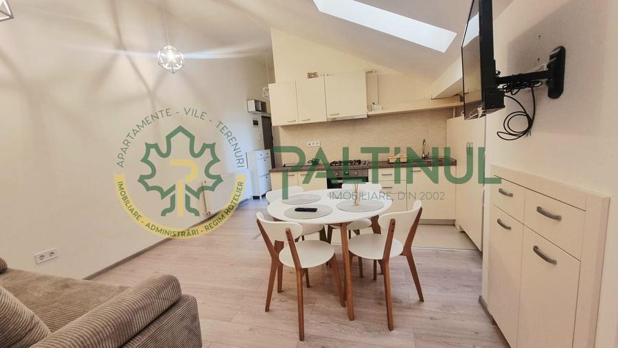 Apartament cu 2 camere semidecomandat, mobilat în Central