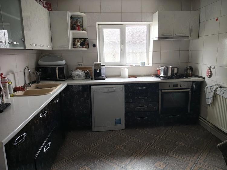 Casă cu Teren 1000 Mp în Central