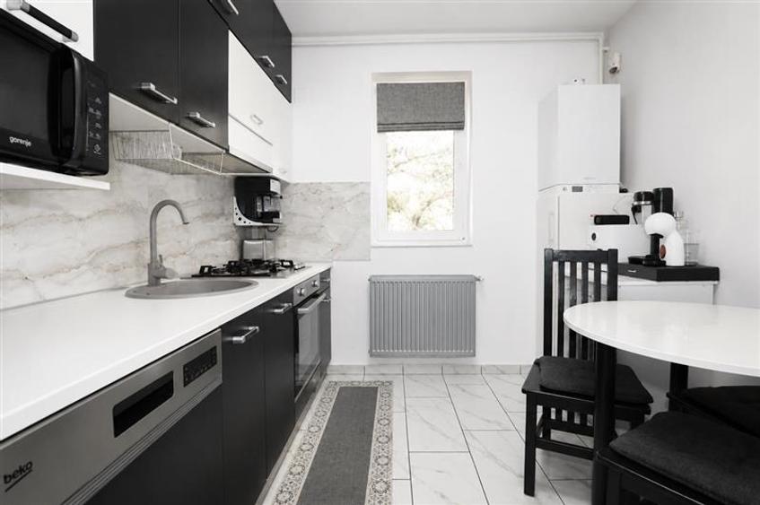 Apartament cu 2 camere decomandat în Tractorul