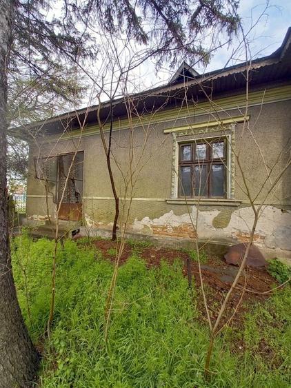 Casă cu 4 camere cu Teren 1700 Mp în Central