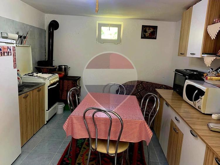 Casă cu Teren 1043 Mp în Dochia