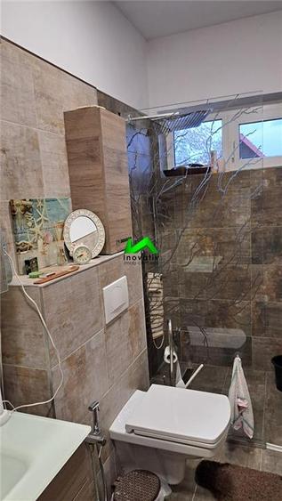 Casă individuală cu 5 camere cu Teren 305 Mp în Central