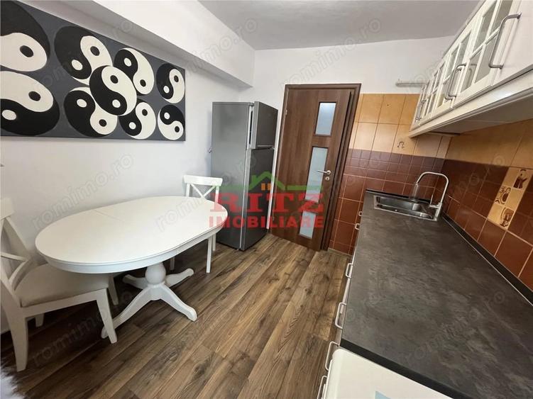 Apartament cu 3 camere decomandat în