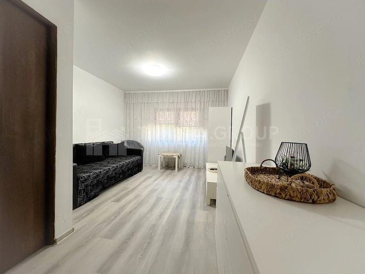 Apartament cu 3 camere decomandat în Tractorul