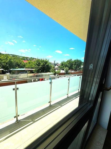 Apartament cu 2 camere decomandat în Bucium — fotografia 3