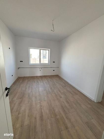 Apartament cu 4 camere în Moșnița Veche