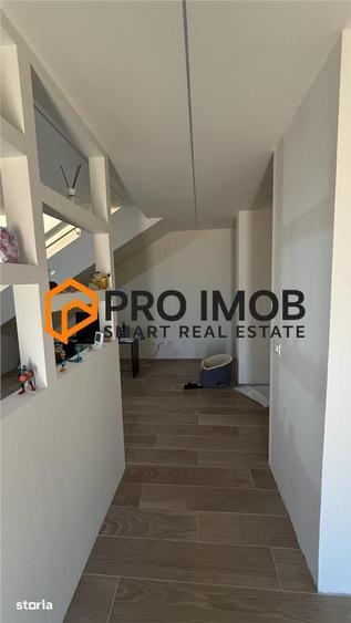 Casa tip P+M si garaj zona Spataru - Costesti - 10