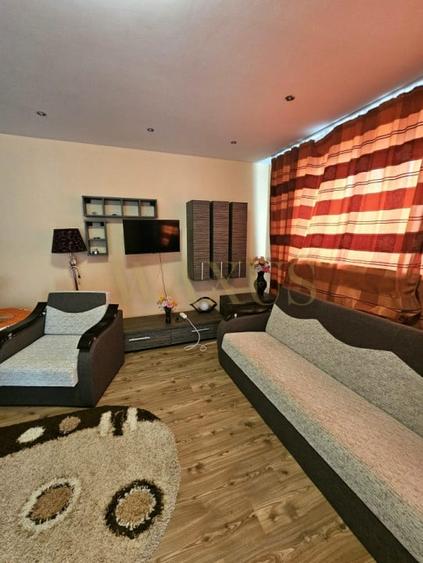 Apartament cu 2 camere, mobilat în Central
