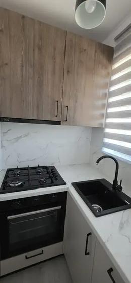 Apartament cu 2 camere semidecomandat, mobilat în Central