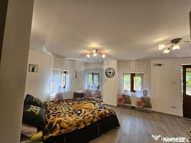 Casă cu 7 camere cu Teren 1134 Mp în Tarcău