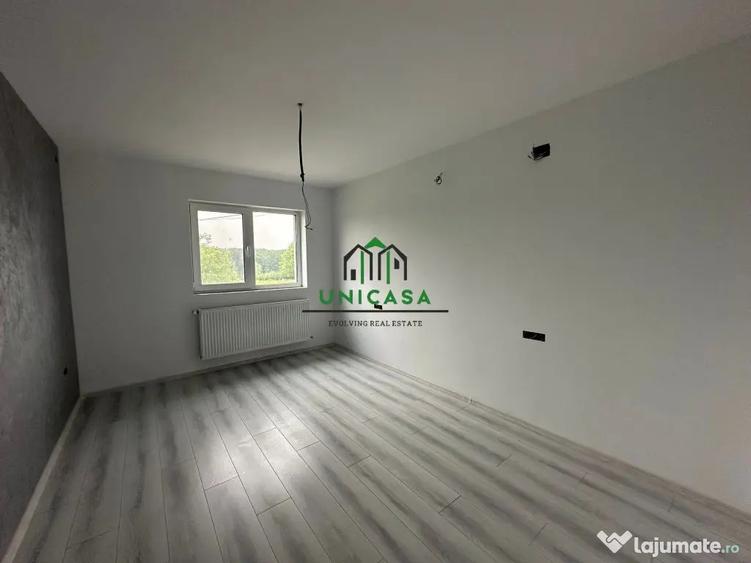 Casă cu 7 camere cu Teren 2000 Mp în Români