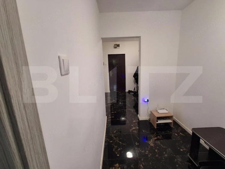 Apartament cu 3 camere decomandat în Filiași