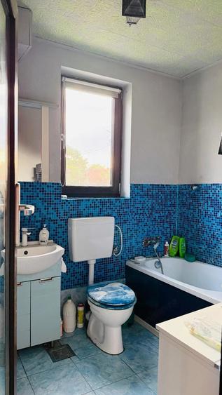 Casă cu Teren 1300 Mp în Parța