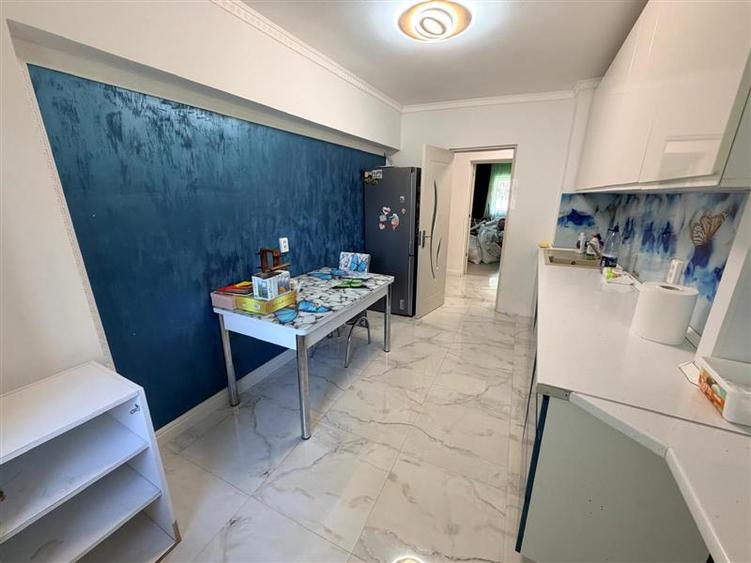Apartament cu 3 camere decomandat  Dacia, bloc 1990 - 23