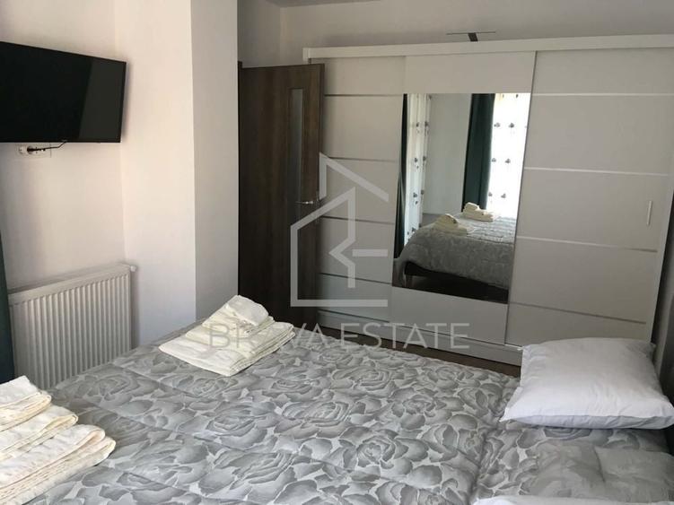 Apartament cu 2 camere semidecomandat, mobilat în Bună Ziua