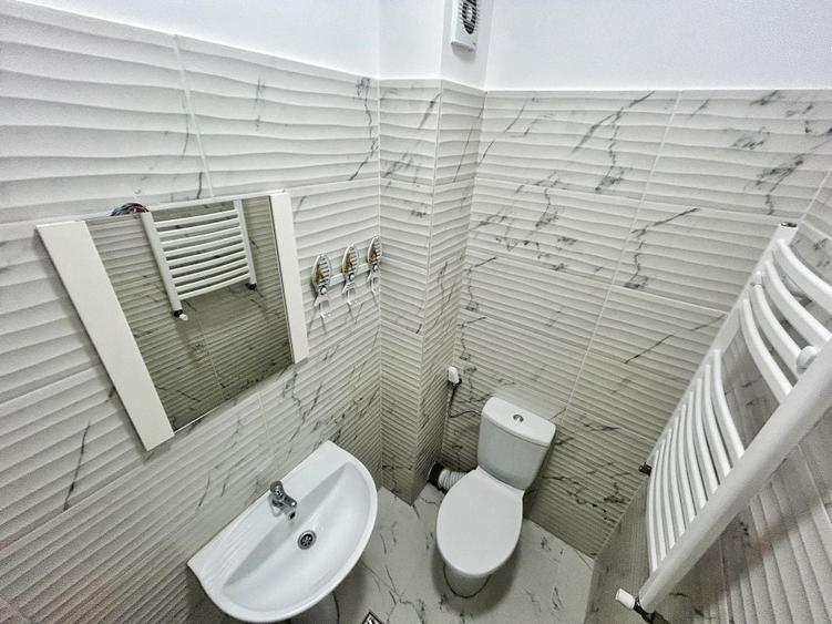 Apartament cu 3 camere decomandat în Cățelu