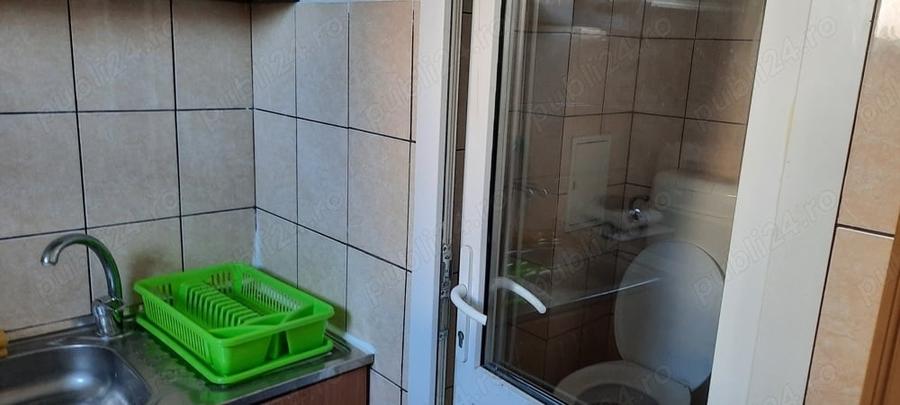 Garsonieră decomandată în Titan