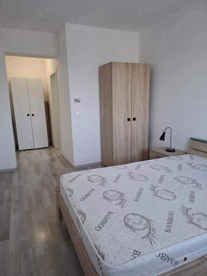 Apartament cu 3 camere decomandat în Tractorul