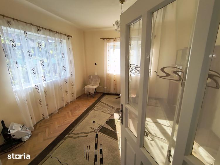 Casă cu 4 camere cu Teren 1000 Mp în Ceuaș