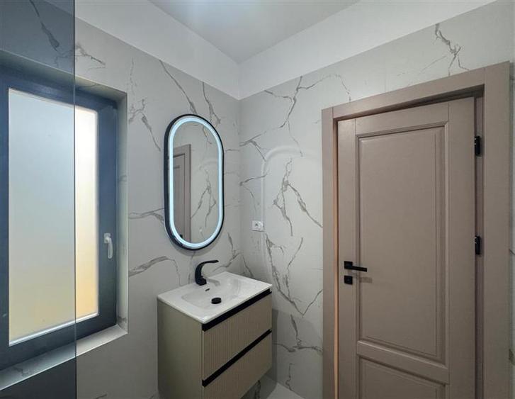 Casă cu 4 camere cu Teren 430 Mp în Bucium