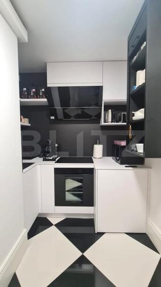 Apartament cu 2 camere semidecomandat, mobilat în Central