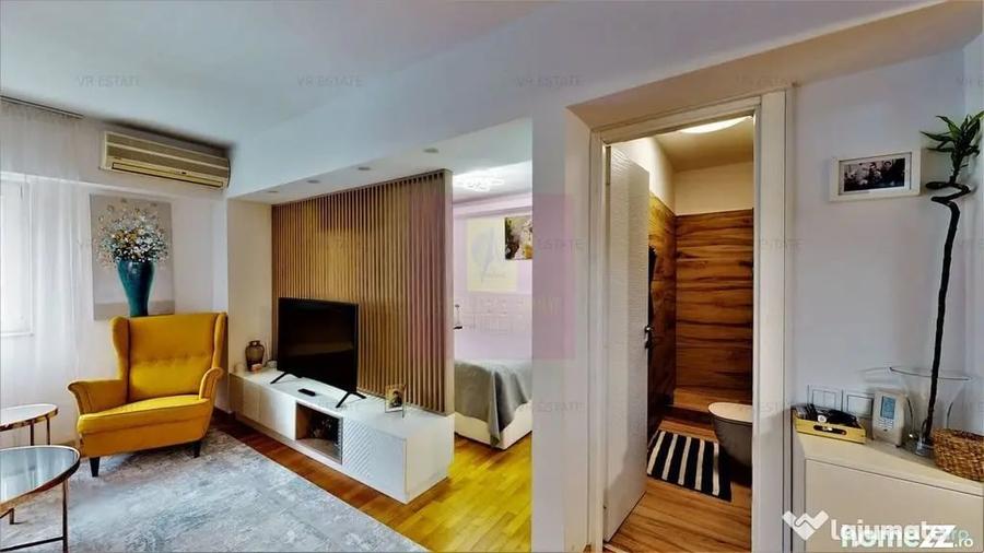 Apartament cu 3 camere semidecomandat în Romană